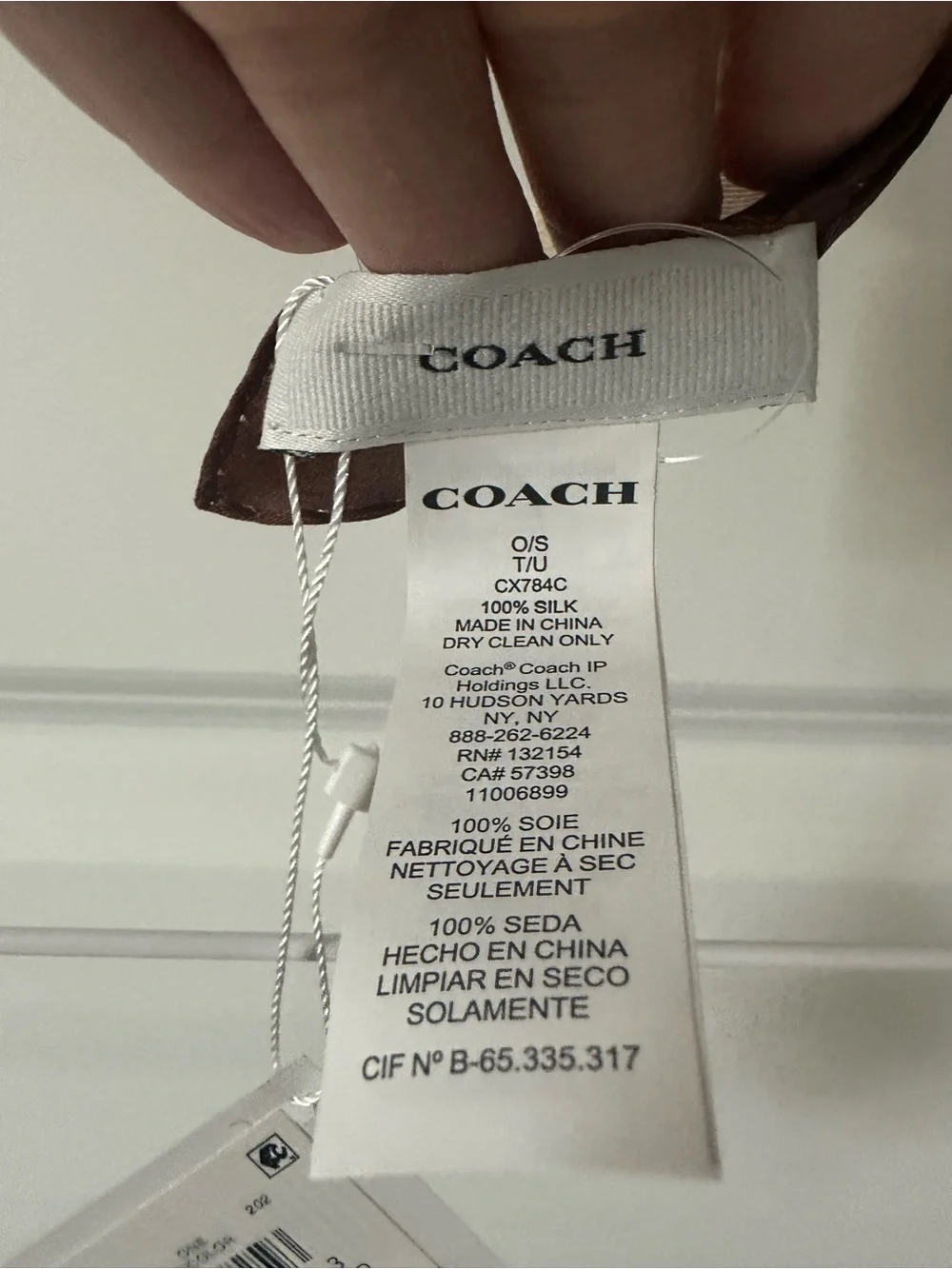 Coach Cream Scarf with Brown and Red Accents
